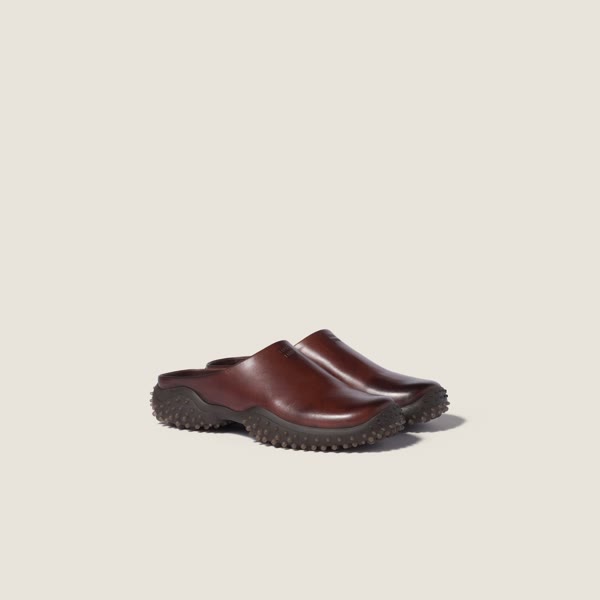 Official product photograph: Miu Miu · Coffee leather mules