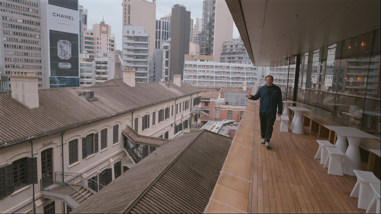 Minaev overlooking Tai Kwun and Central rooftops